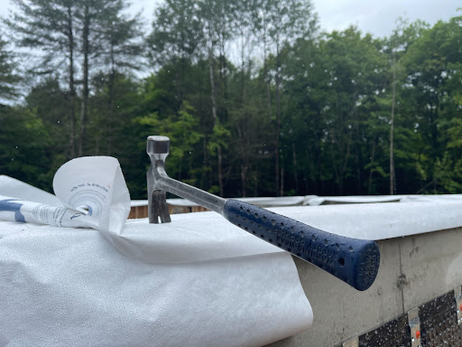 Hammer holding down plans