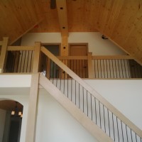 Custom Maple Closed Stringer Stair; Custom Maple Contemporary Handrail; Wrought Iron Pickets; Custom Square Newel Post
