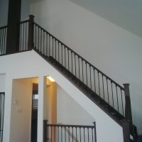 Oak Stair Landing; Colonial Oak Handrail; Wrought Iron Pickets; Box Panel Style Newel Post